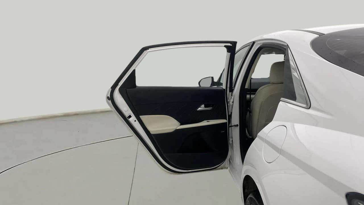 Rear door open view of a Hyundai Verna