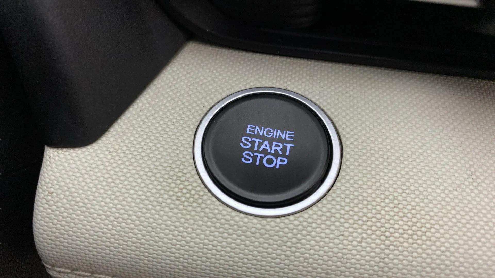 Close-up of the engine start stop button of a Hyundai Verna