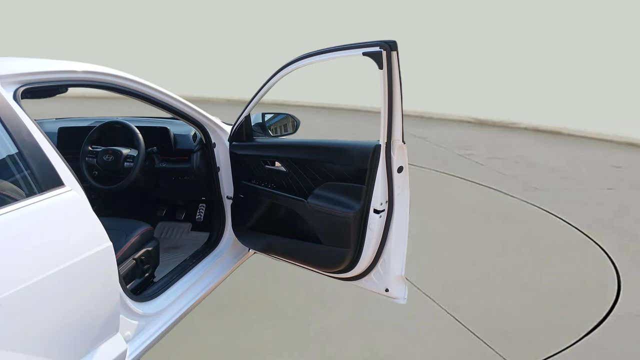 Driver seat and dashboard view of a Hyundai Verna