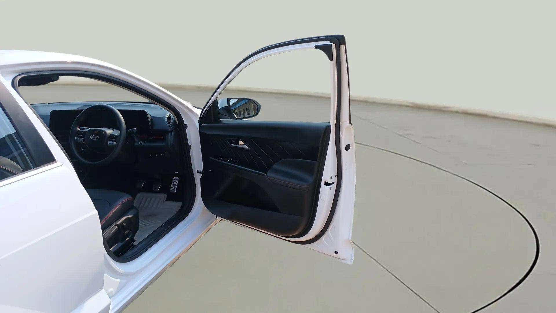 Driver seat and dashboard view of a Hyundai Verna