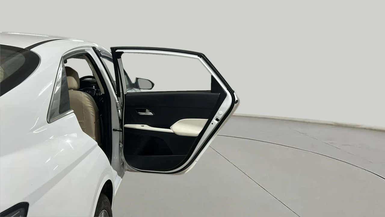 Rear left door open view of a Hyundai Verna
