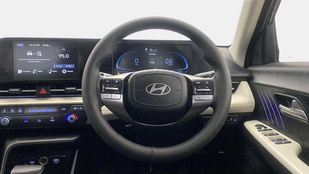 Dashboard and steering wheel of a Hyundai Verna