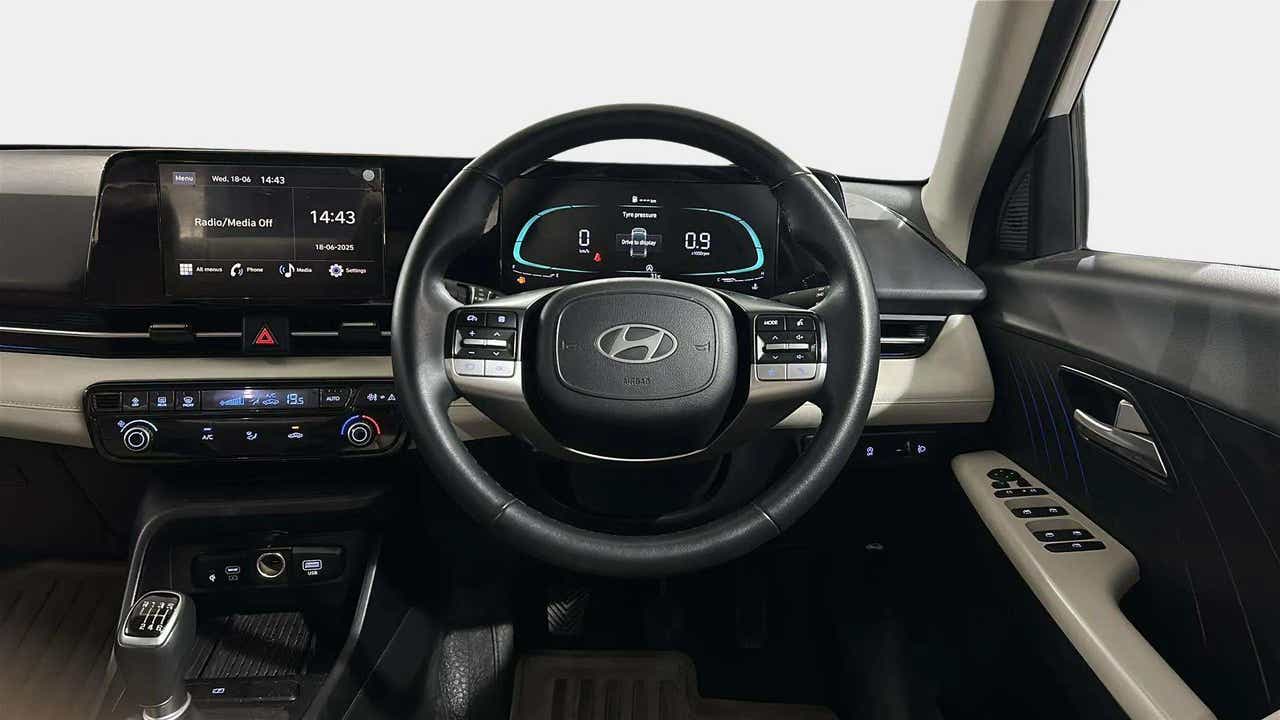 Interior dashboard view of a Hyundai Verna