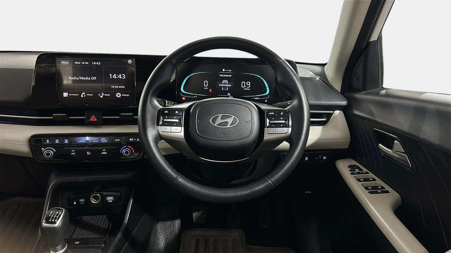 Interior dashboard view of a Hyundai Verna