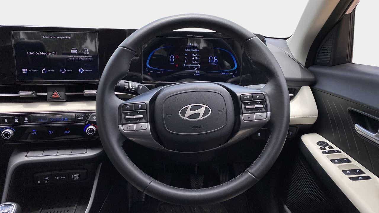 Interior dashboard view of a Hyundai Verna