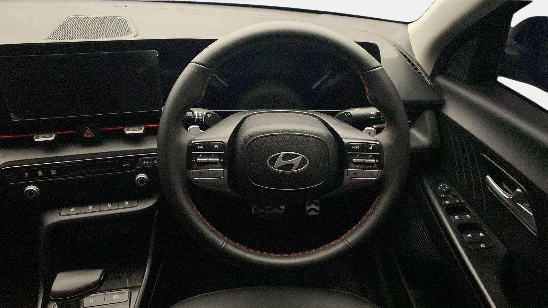 Interior dashboard and steering wheel of a Hyundai Verna