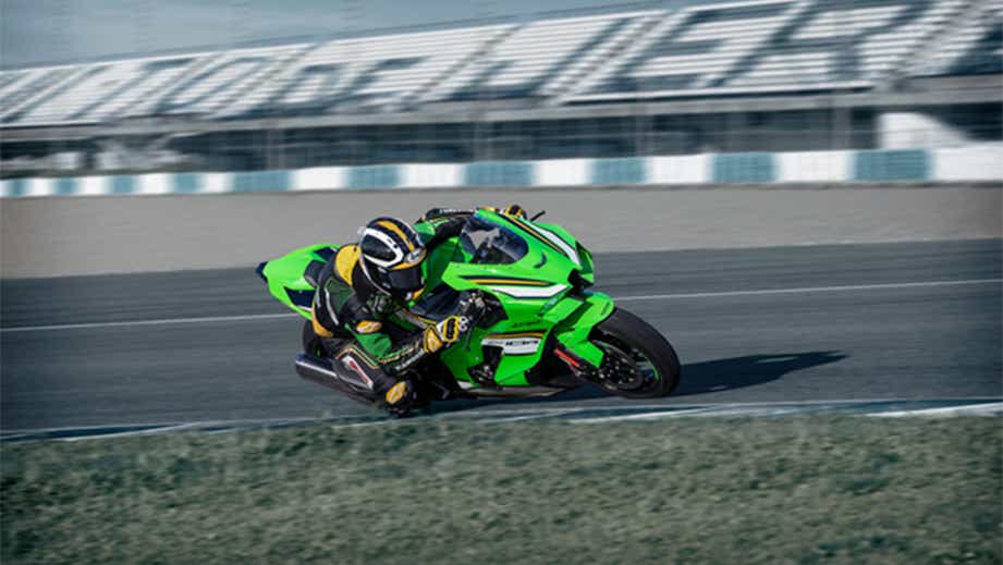 Rider on a lime green Kawasaki Ninja ZX-10R 2026 on race track