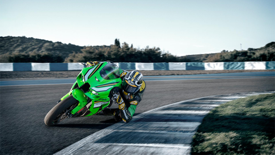 Racing action shot of a lime green Kawasaki Ninja ZX-10R 2026