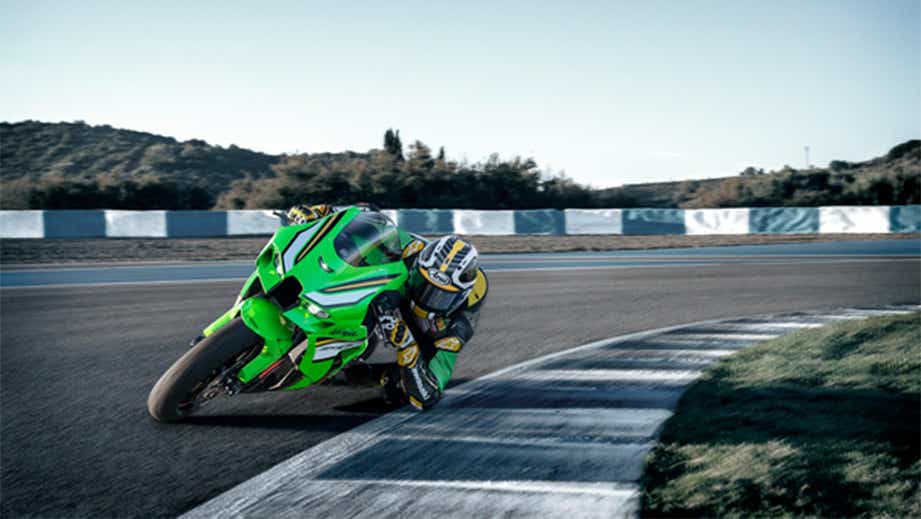 Racing action shot of a lime green Kawasaki Ninja ZX-10R 2026