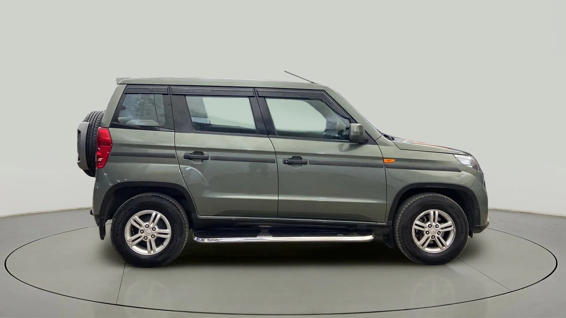 Side view of a Mahindra Bolero Neo