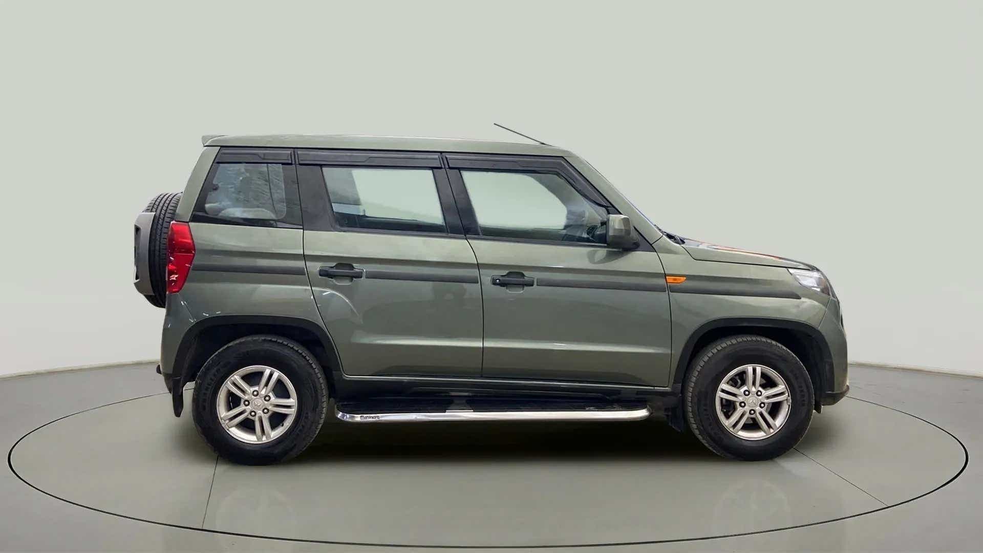 Side view of a Mahindra Bolero Neo