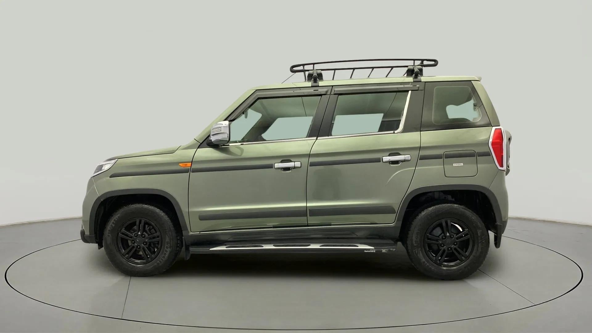 Side view of a Mahindra Bolero Neo