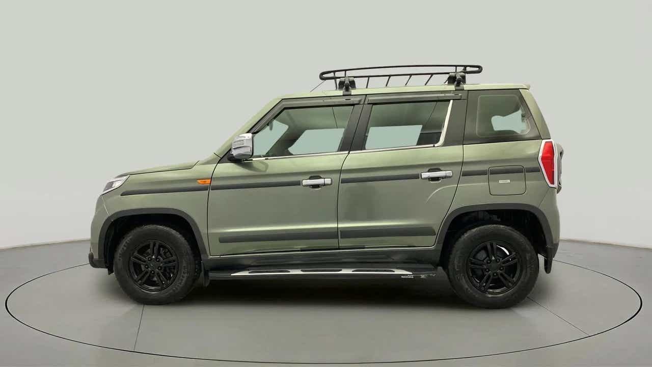 Side view of a Mahindra Bolero Neo