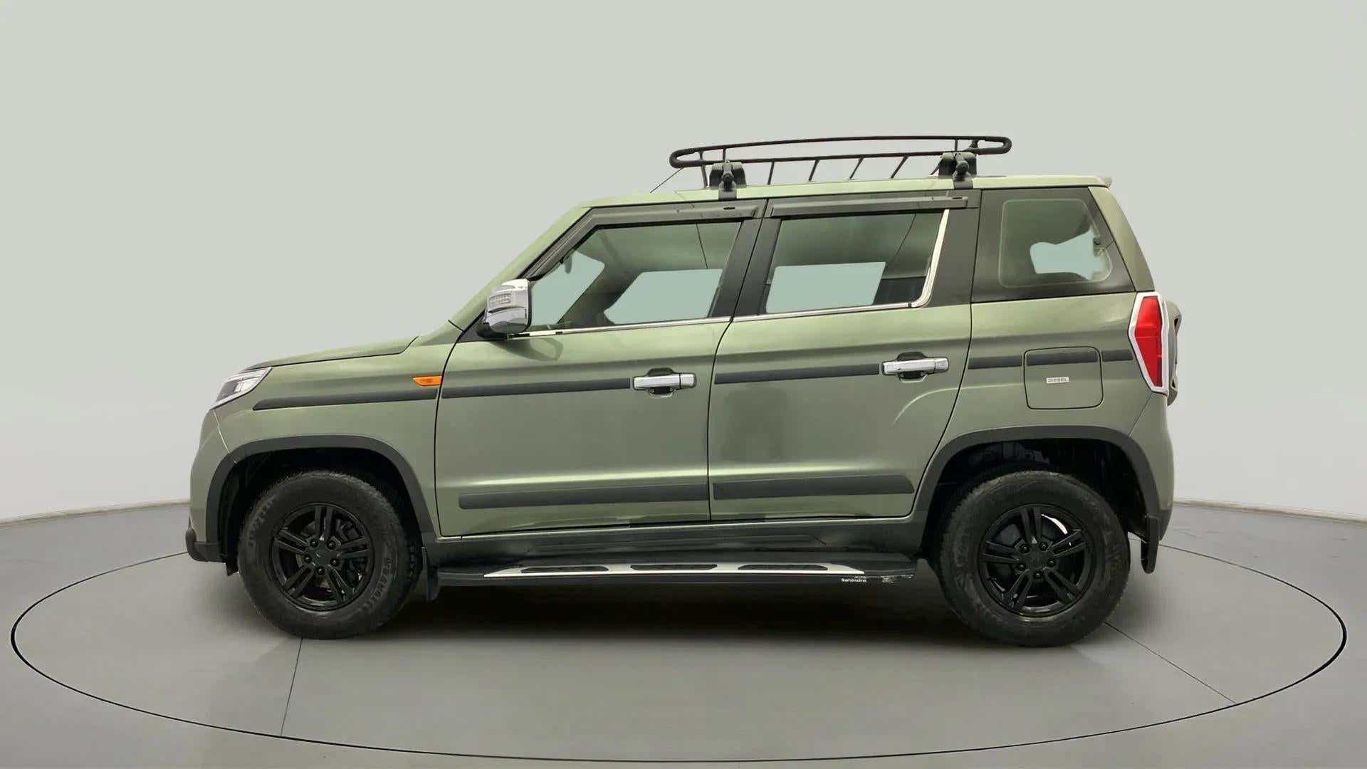 Side view of a Mahindra Bolero Neo