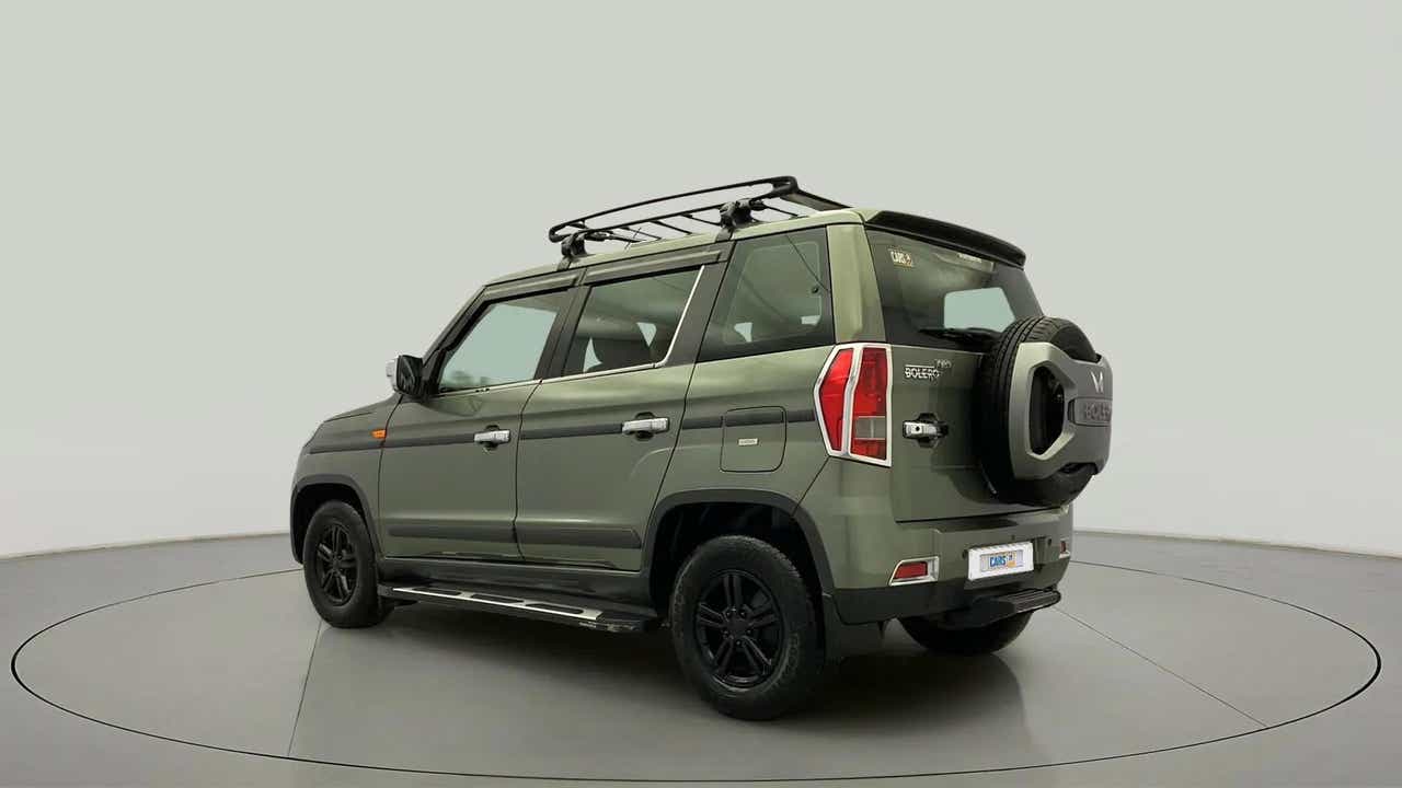 Rear three-quarter of a Mahindra Bolero Neo