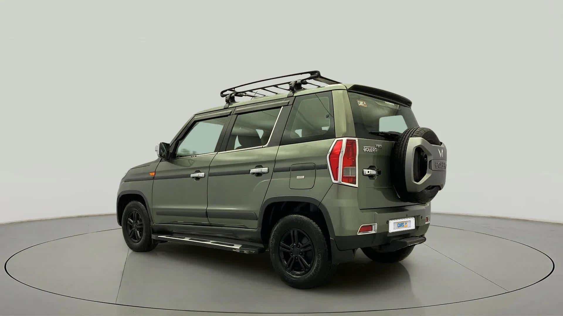 Rear three-quarter of a Mahindra Bolero Neo