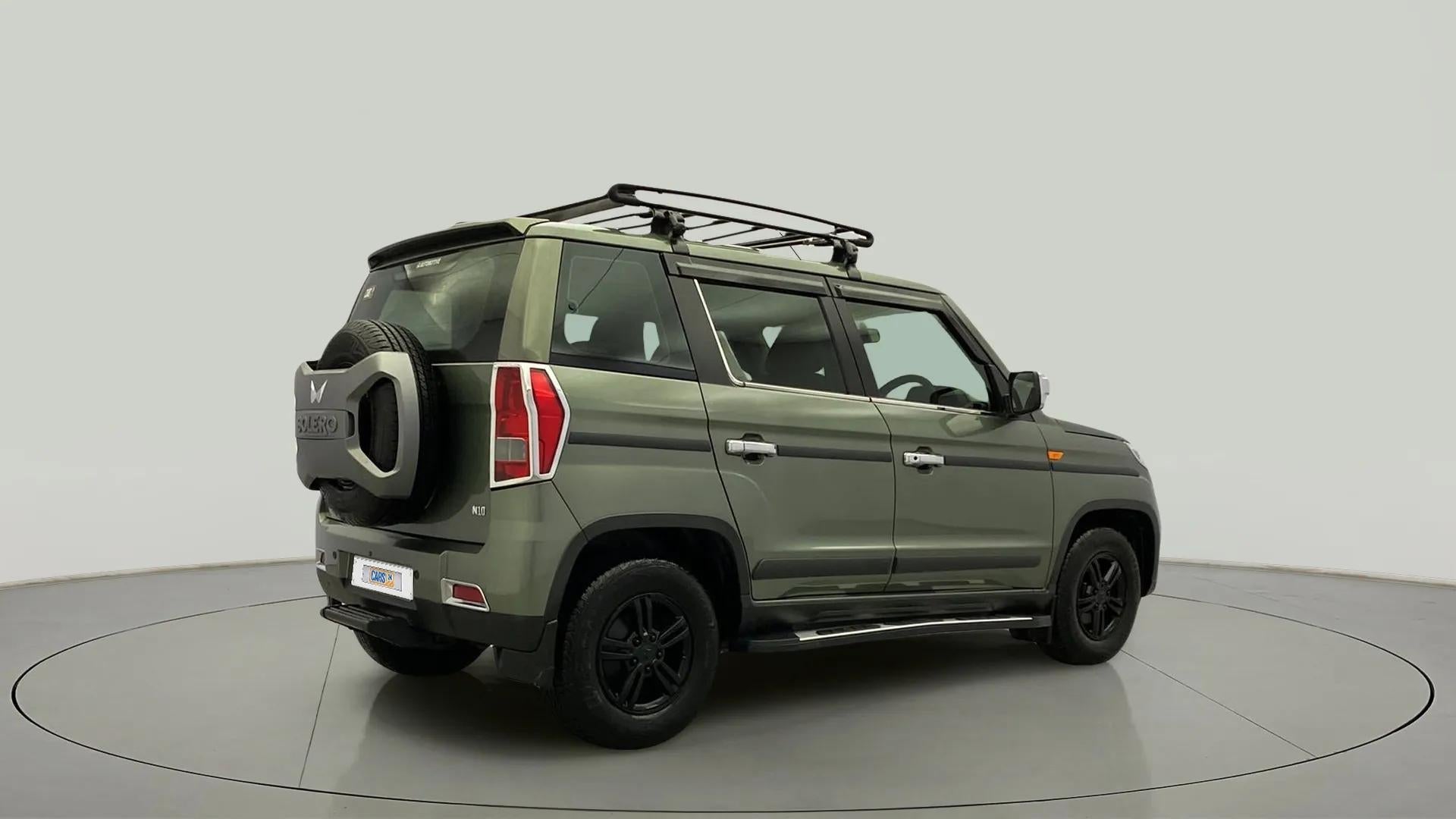 Rear three-quarter of a Mahindra Bolero Neo