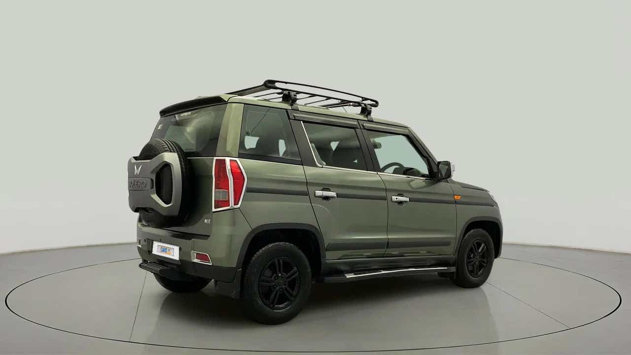 Rear three-quarter of a Mahindra Bolero Neo