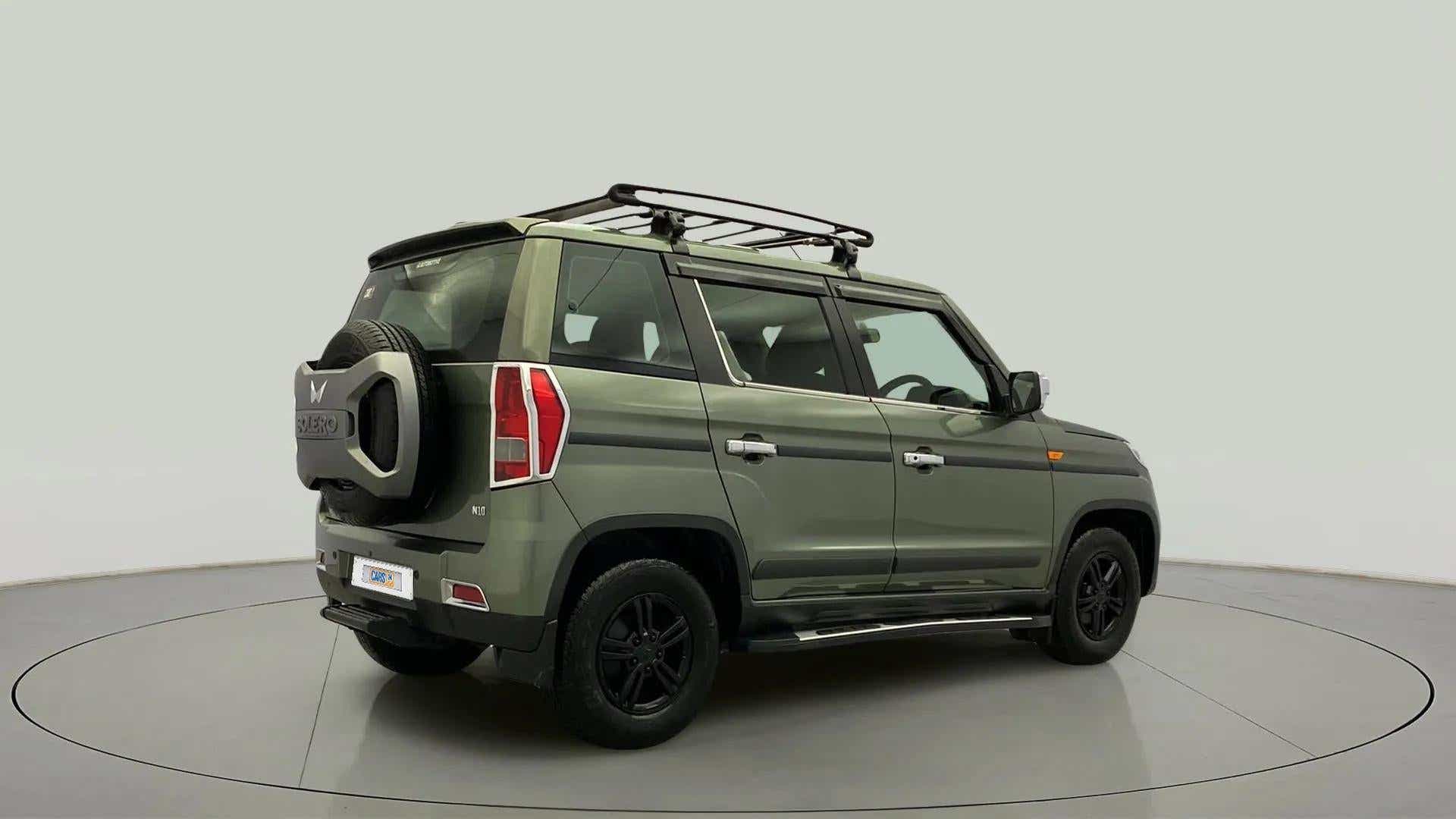 Rear three-quarter of a Mahindra Bolero Neo