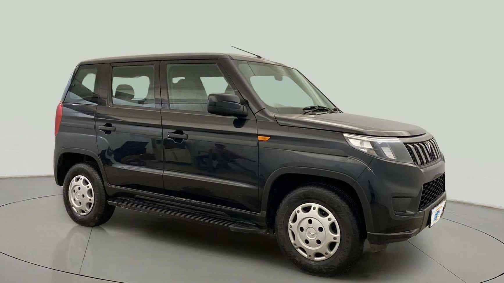 Side view of a Mahindra Bolero Neo