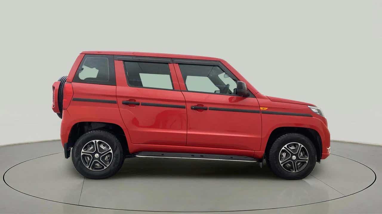 Side view of a Mahindra Bolero Neo