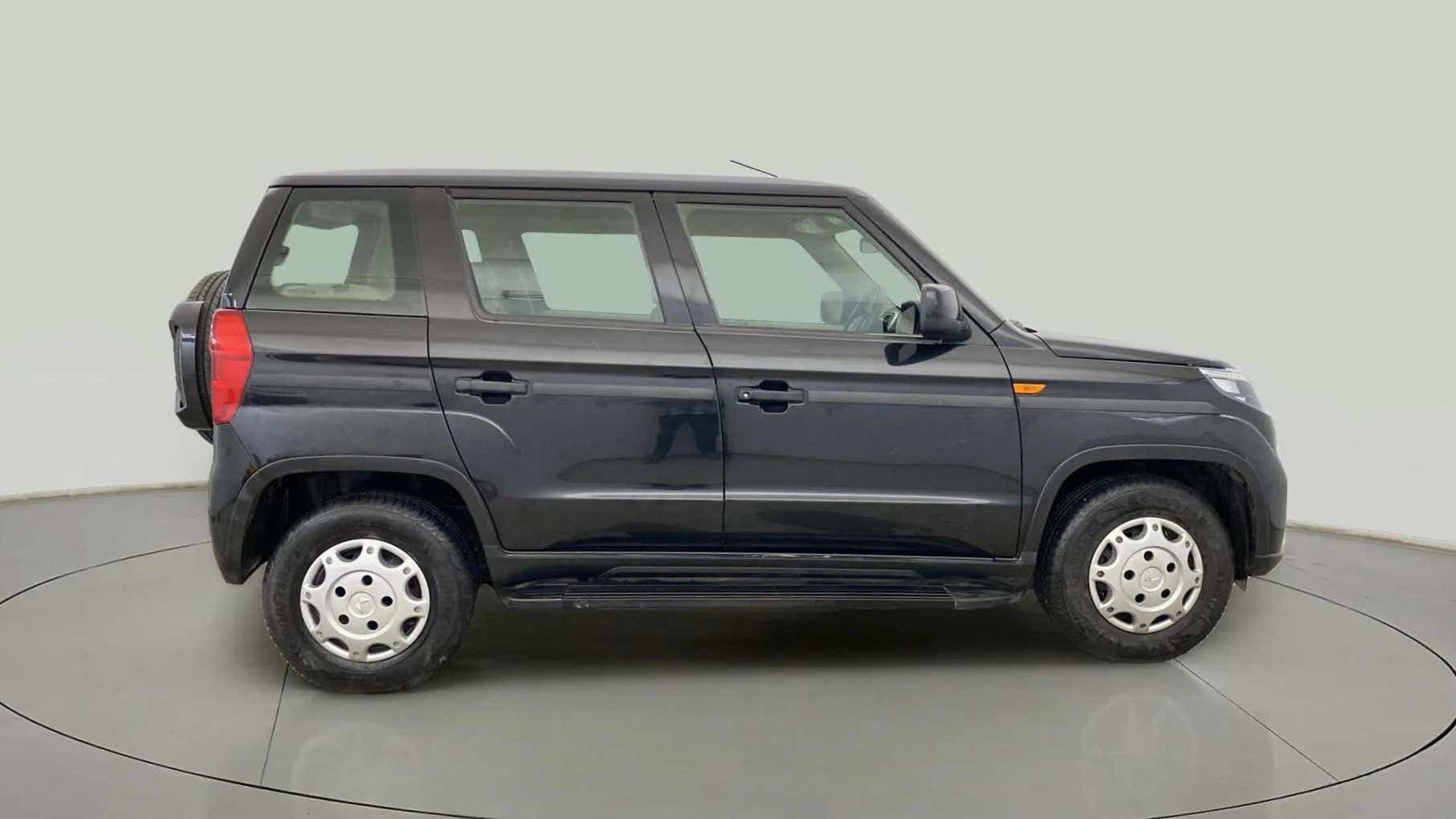 Side view of a Mahindra Bolero Neo