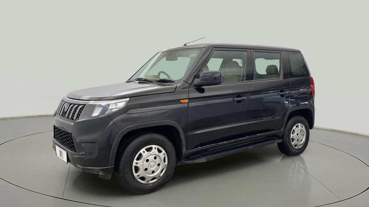 Front and side view of a Mahindra Bolero Neo