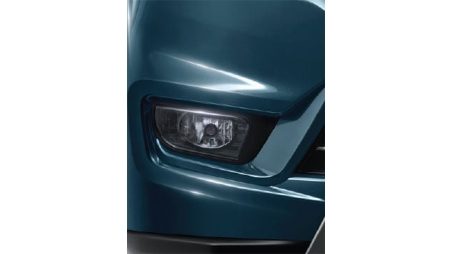 Headlight close-up of a Mahindra Bolero Neo