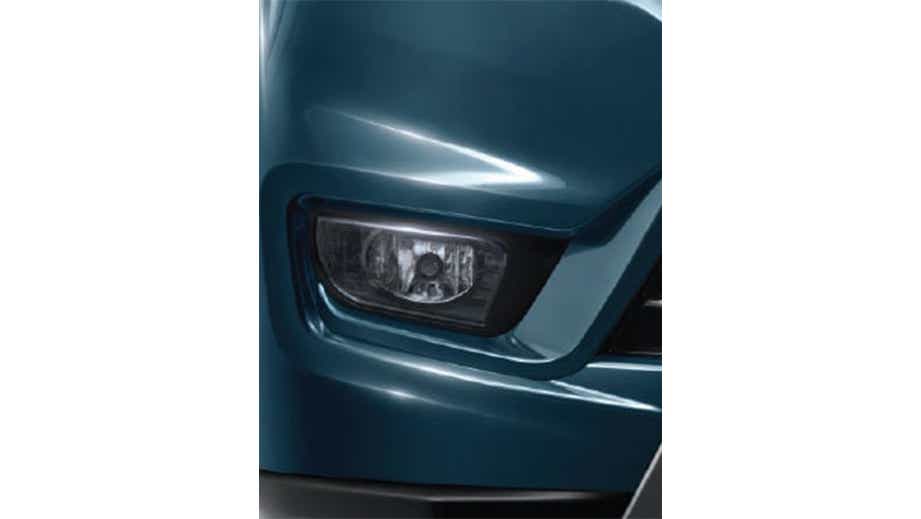 Headlight close-up of a Mahindra Bolero Neo