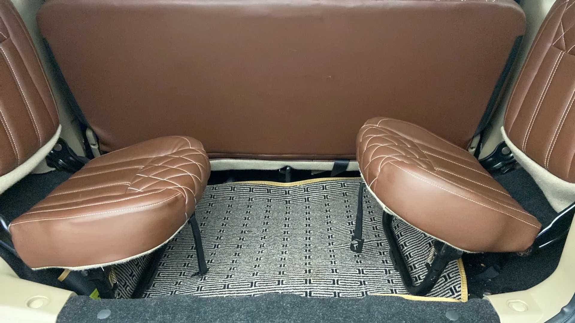 Rear seat and footwell view of a Mahindra Bolero Neo