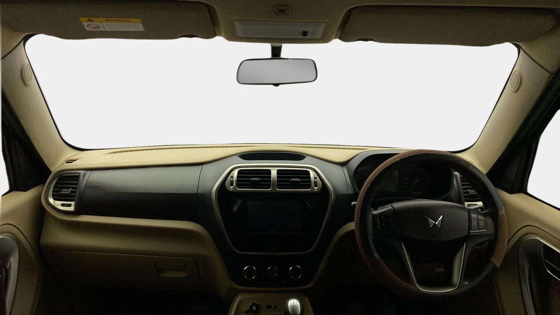 Dashboard and steering wheel view of a Mahindra Bolero Neo