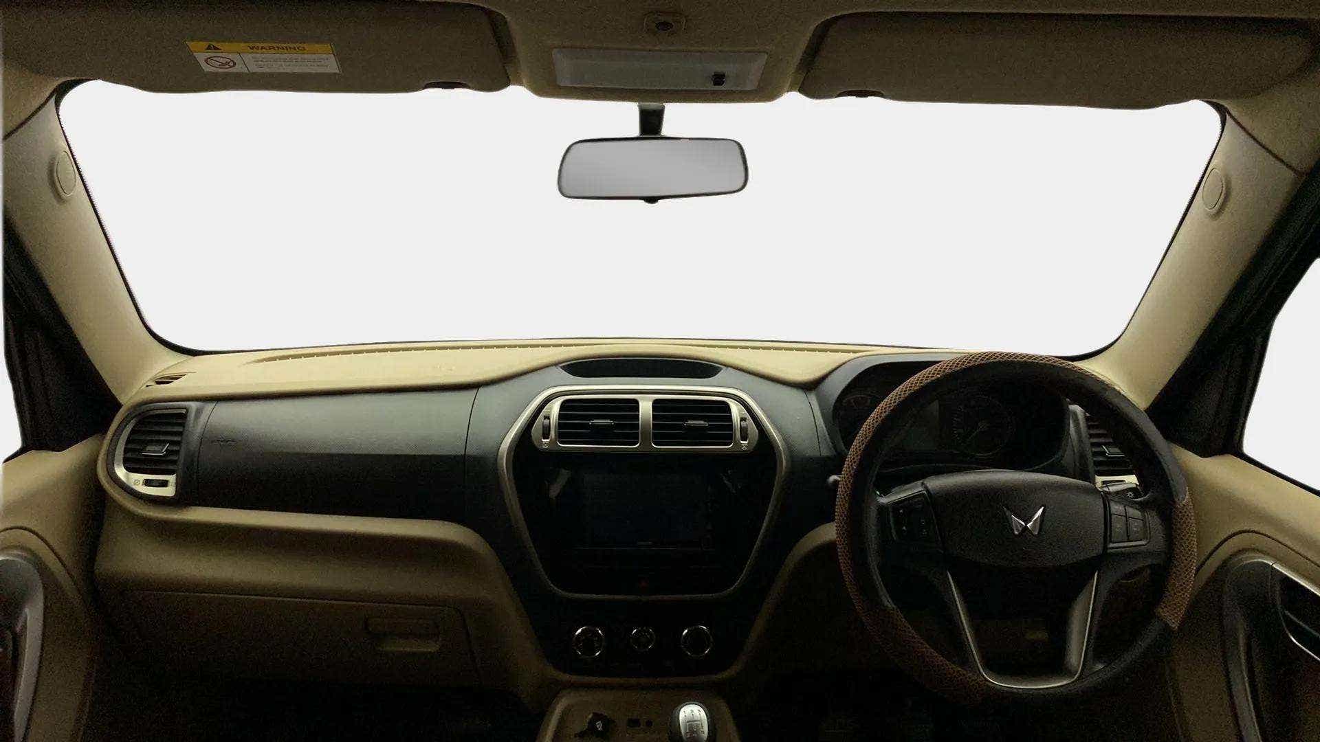Dashboard and steering wheel view of a Mahindra Bolero Neo