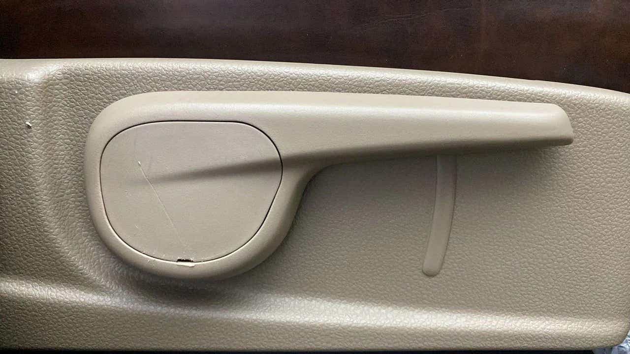 Close-up of an interior door handle of a Mahindra Bolero Neo