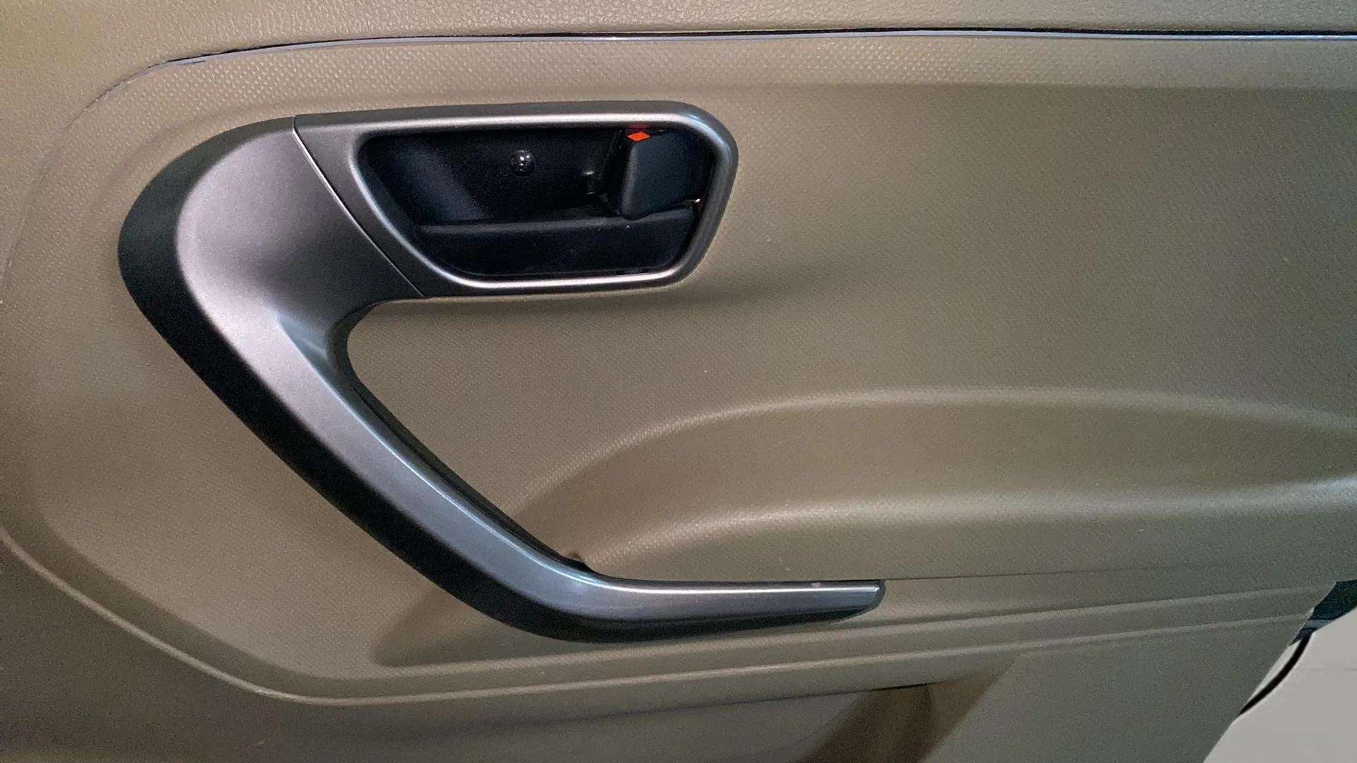 Interior door handle of a Mahindra Bolero Neo