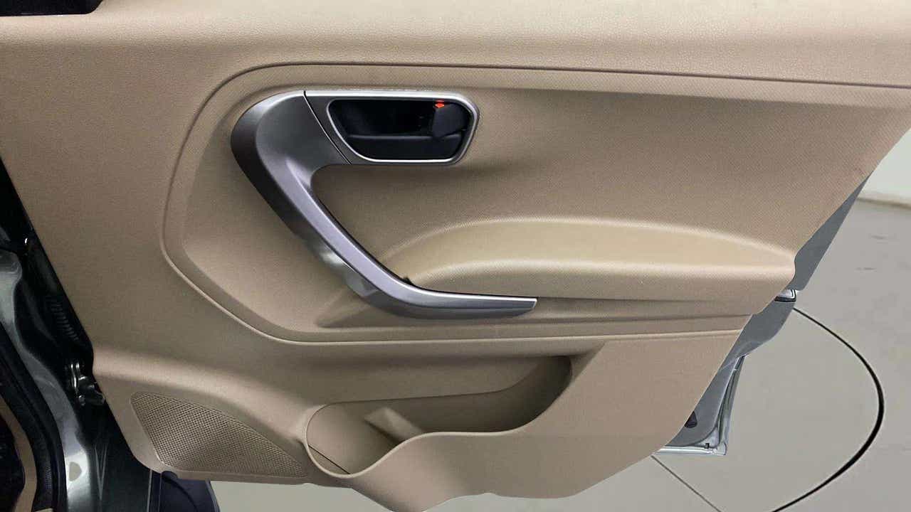 Close-up of the interior rear door panel of a Mahindra Bolero Neo