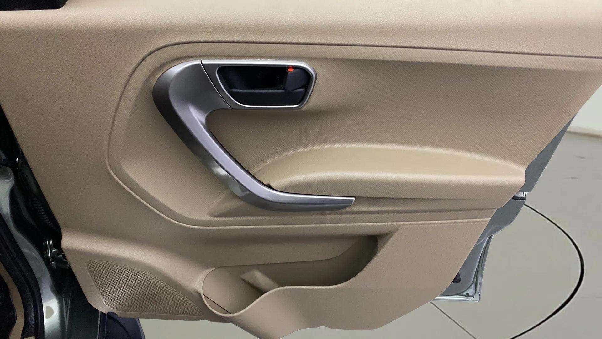 Close-up of the interior rear door panel of a Mahindra Bolero Neo