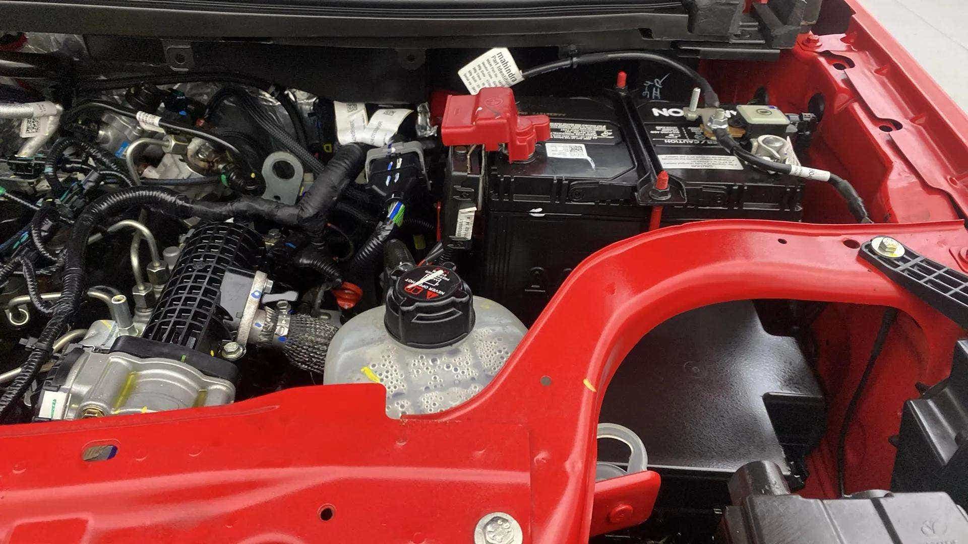 Engine bay view of a Mahindra Bolero Neo