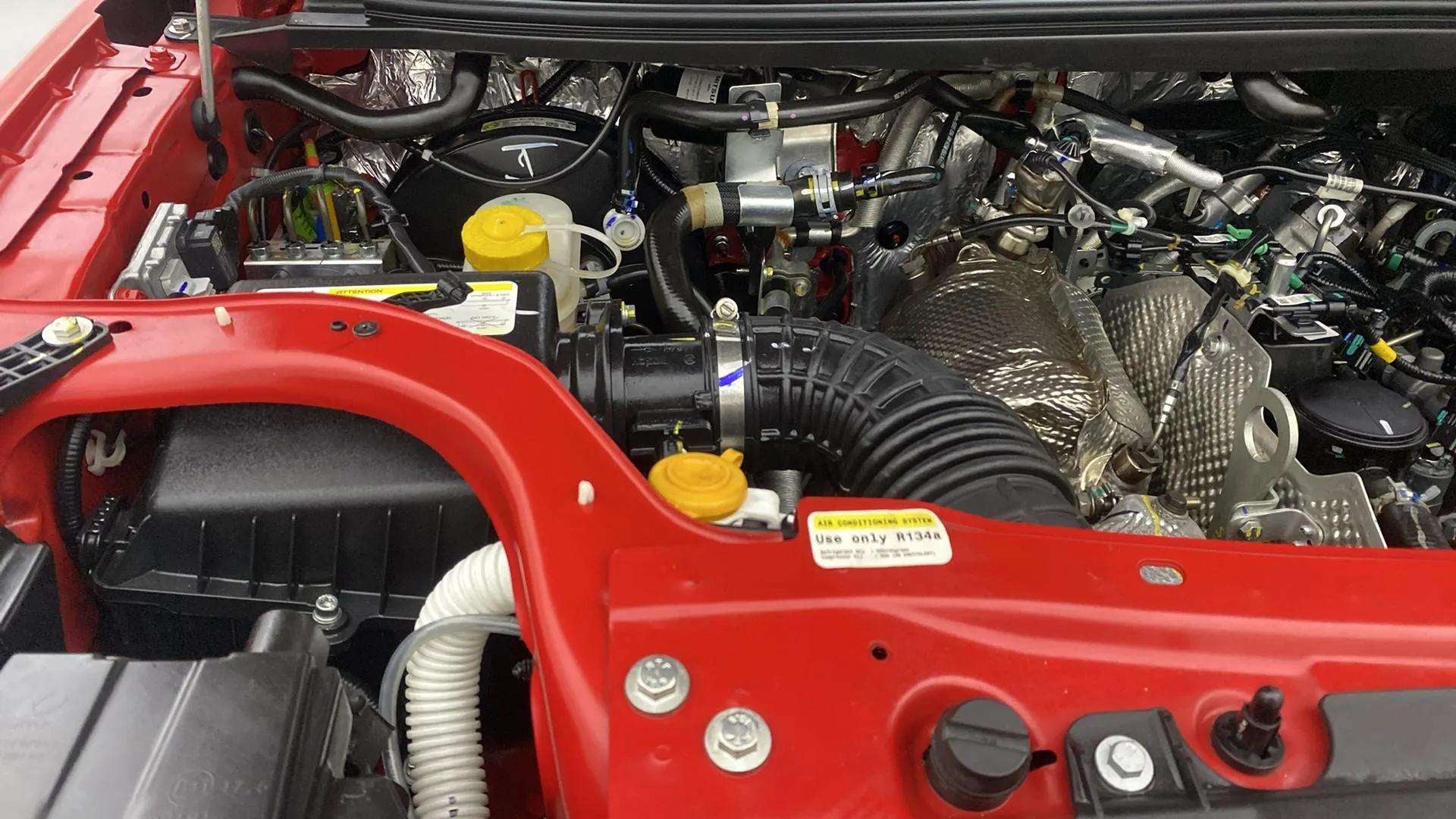 Engine bay view of a Mahindra Bolero Neo