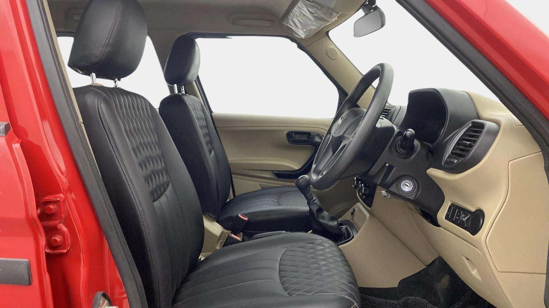 Interior front seats and dashboard of a Mahindra Bolero Neo