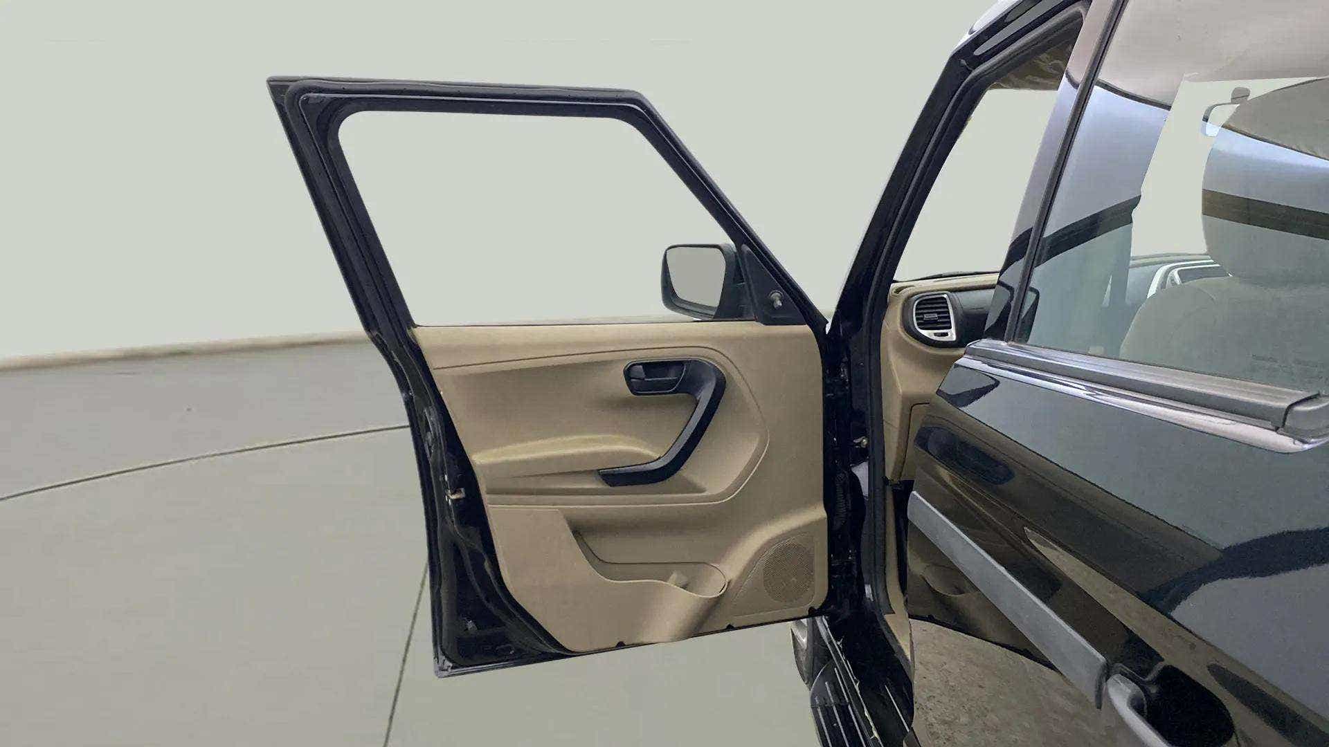 Front driver-side door open view of a Mahindra Bolero Neo