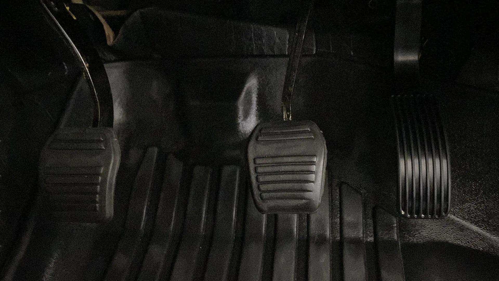 Foot pedals close-up of a Mahindra Bolero Neo