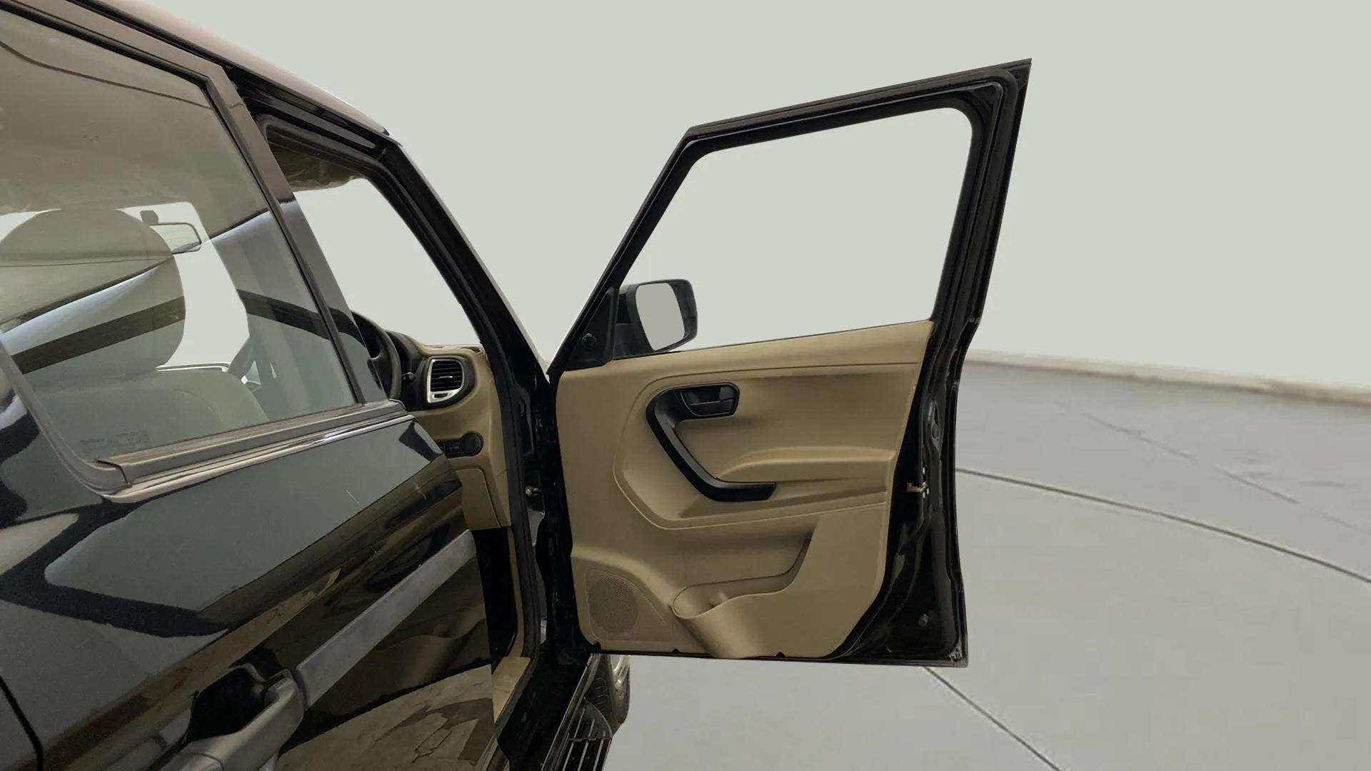 Front left door open view of a Mahindra Bolero Neo