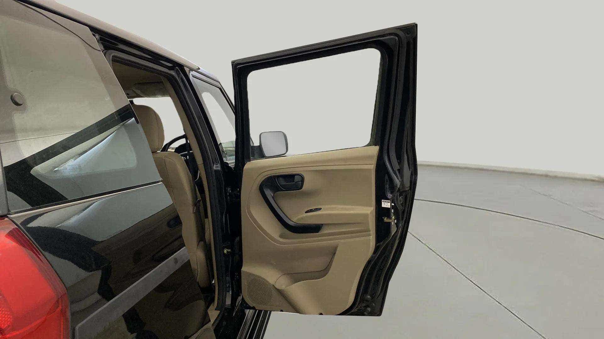 Open rear door view of a Mahindra Bolero Neo
