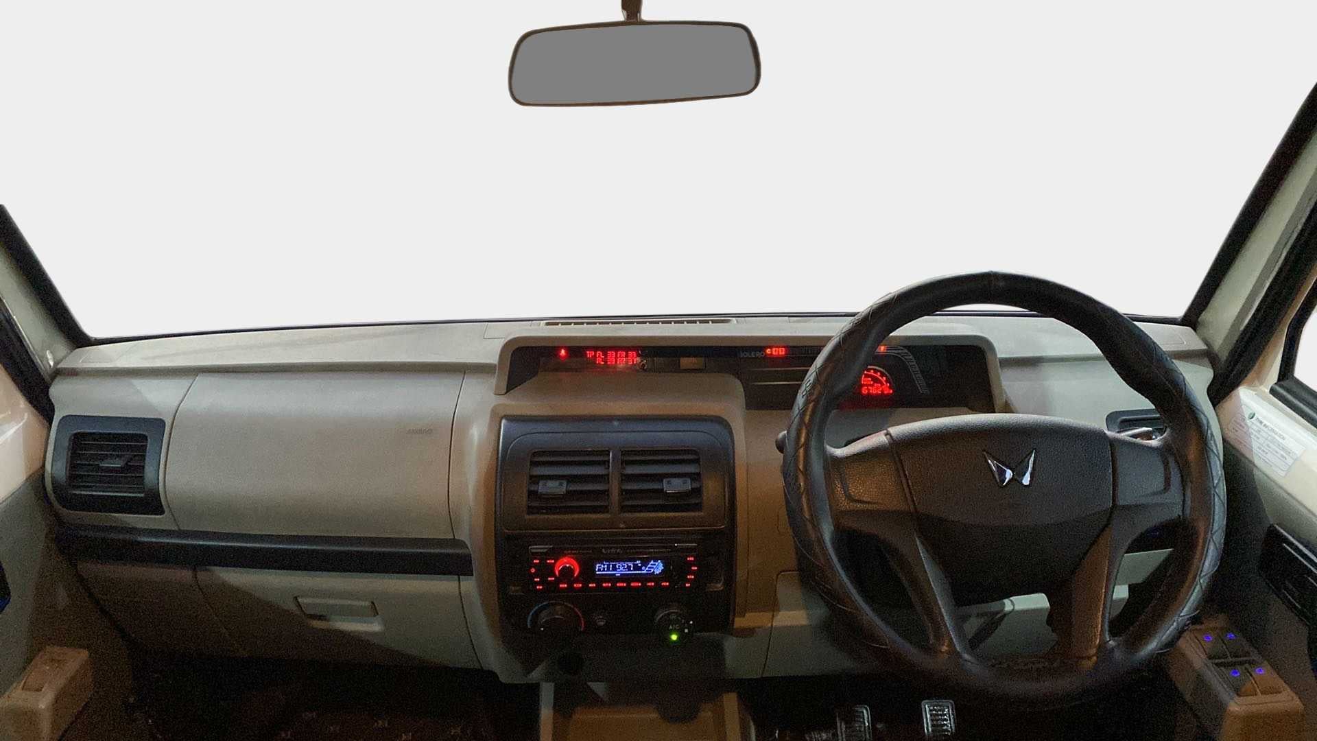 Interior dashboard view of a Mahindra Bolero