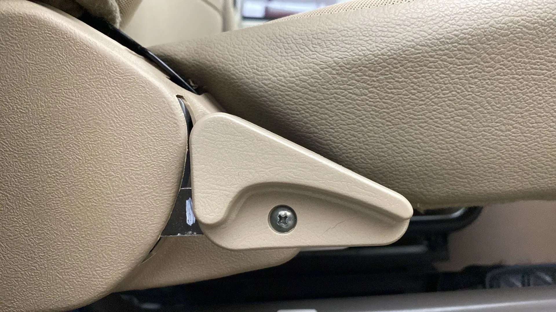 Seat adjuster lever of a Mahindra Bolero