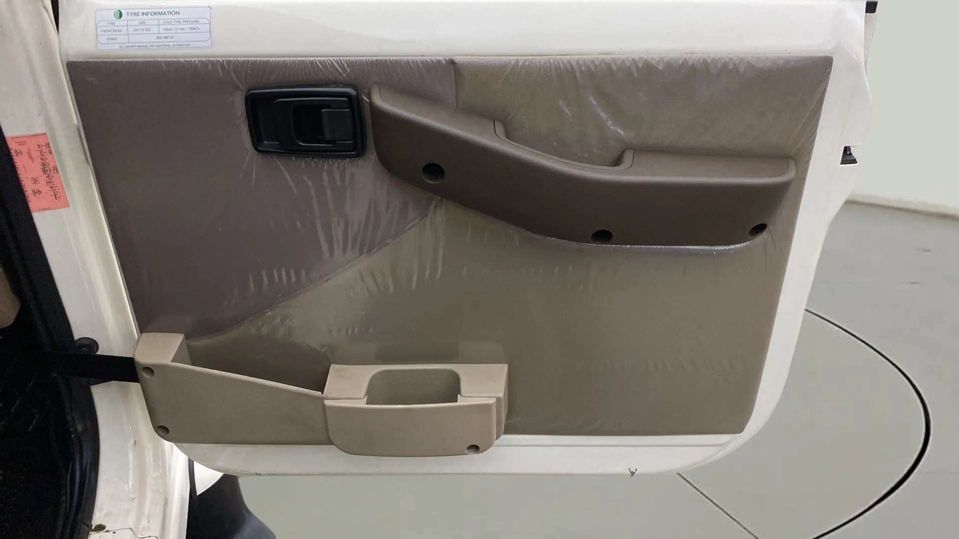 Interior door panel of a Mahindra Bolero