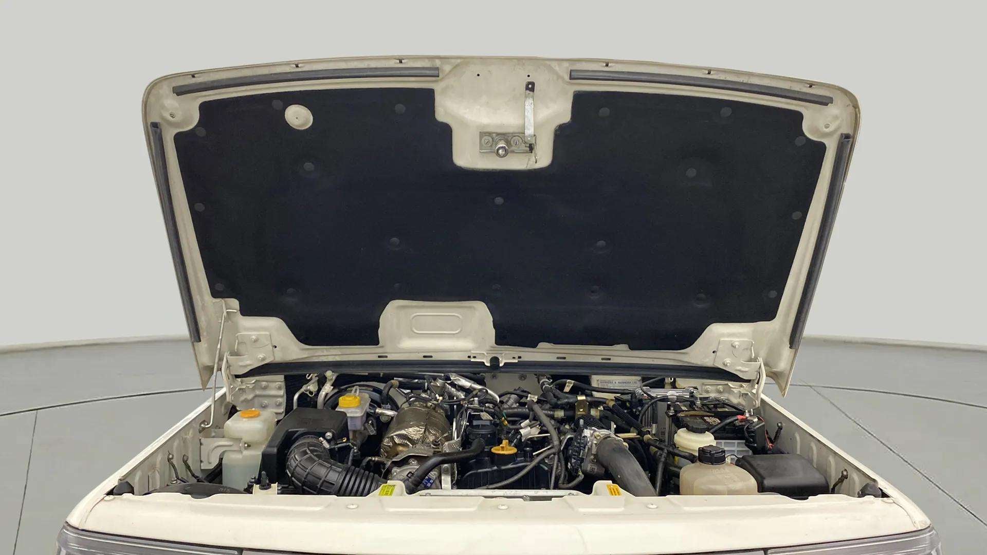 Engine bay view of a Mahindra Bolero