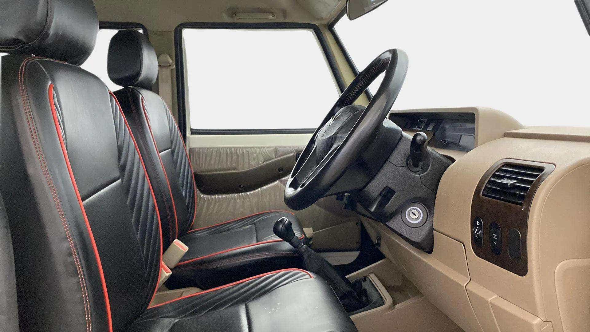 Interior dashboard view of a Mahindra Bolero