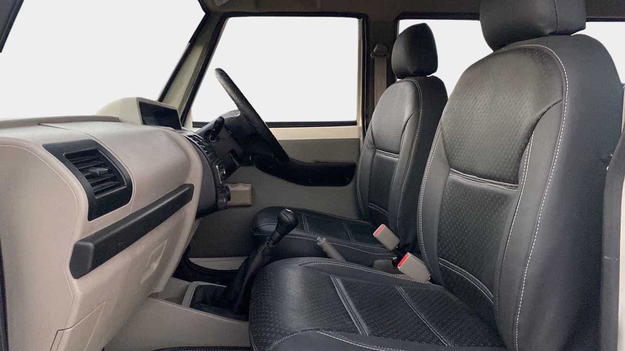 Interior dashboard and front seats of a Mahindra Bolero