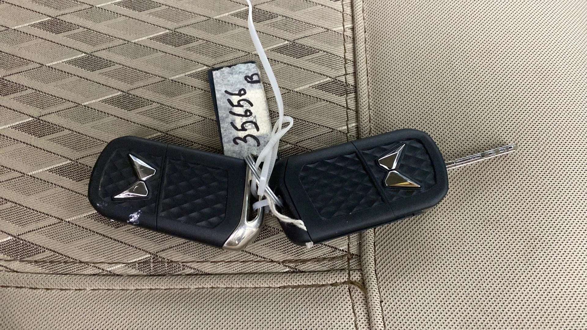 Car key fobs on seat of a Mahindra Bolero